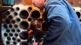 Installing flue tubes in the boiler of a steam loco Ropley Mid Hants Railway UK [upl. by Say]