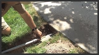 How to install a sprinkler pipeconduit under a sidewalk [upl. by Rushing]