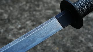 Forging a Damascus Katana from 1000 paperclips [upl. by Avrenim]