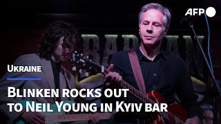 Blinken rocks out to Neil Young in Kyiv bar on visit to Ukraine  AFP [upl. by Eiramit969]