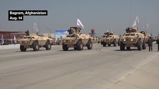 Taliban Hold Parade at Former US Base in Afghanistan [upl. by Annaehr346]