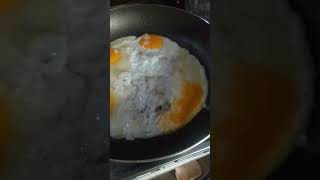 Sunny Side Up eggs trending cooking music viralvideo youtubeshorts [upl. by Nylzaj680]