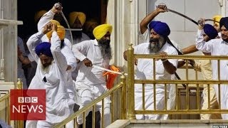 Sikh groups clash with swords at Indias Golden Temple  BBC News [upl. by Eelirrem120]