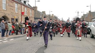 Massed Pipes and Drums of Scottish Highlands march through Alness for Charity event in April 2023 [upl. by Plath]