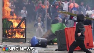 Farright antiimmigrant riots break out across the UK [upl. by Aceber]