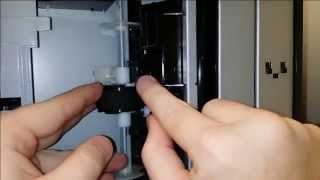 How to replace the pick roller on an HP Color LaserJet CP2025 printer [upl. by Adoh]