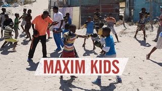 Coach Allen Chizungu and Niemand quotchanging knives to boxing glovesquot Maxim Kids Boxing Documentary [upl. by Sev]