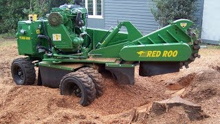 Stump Grinder big Cypress tree stumps [upl. by Godred]