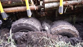 Valtra T144 with large trailer Kronos 160 4WDM logging in wet forest stuck in the mud [upl. by Annamarie]