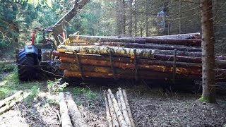 Valtra forestry tractor stuck in wet forest [upl. by Nevah]