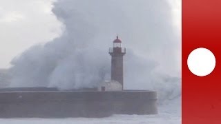 Atlantic storm Huge waves crash into lighthouse in Portugal [upl. by Adnilem]