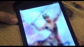 Get a Custom Lock Screen Background on Your Nexus 7 HowTo [upl. by Aidas366]