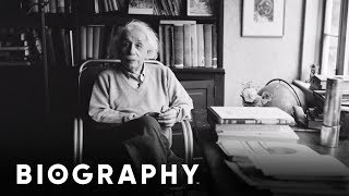 Albert Einstein  Nobel Prize Winner amp Physicist  Mini Bio  Biography [upl. by Hgeilyak]