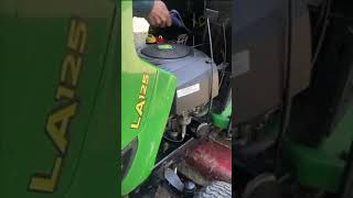 How to change a Battery on a John Deere Lawn Tractor mower 100 Series [upl. by Aitan]