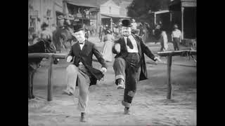 Laurel amp Hardy dance to Technotronic [upl. by Terena492]