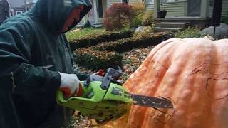 Giant Pumpkin Jack O Lantern carved with a Chainsaw [upl. by Collin]