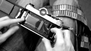 Praktica Super TL loading a film into the camera [upl. by Dido516]