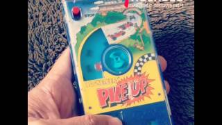 TOMY Pocketeers Pile Up Car Racing Game 1977 [upl. by Iliram]