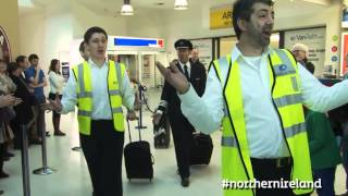 Flash Mob Choir A special Northern Ireland welcome  this is how we do it [upl. by Eglantine]