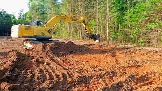 Putting in drainage pipe and doing some light grading [upl. by Ynatsyd710]