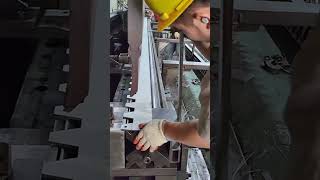 the process of bending metal to the desired shape using a press at a factory [upl. by Faxon]