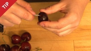 How to Pit a Cherry with a Paper Clip  CHOW Tip [upl. by Katti]