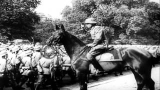 German troops decorated and troops pass in review along Avenue Foch Paris durinHD Stock Footage [upl. by Jovi]