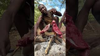 Hadzabe bushmen cook their steak meat naturally in the forest over the fire [upl. by Annim]