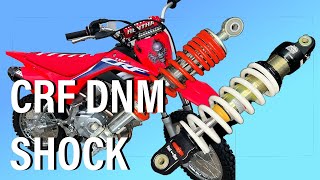 CRF110 SUSPENSION UPGRADE HOW TO INSTALL DNM SHOCK [upl. by Antonella]