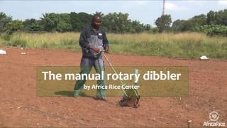 Manual rotary dibbler by AfricaRice [upl. by Arbmahs]