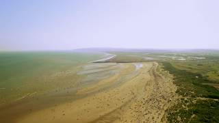 Camber Sands in UK  Drone view of seaside and dunes [upl. by Eednyl425]