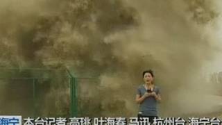 Look behind you Huge wave lands on TV reporter [upl. by Yrgoerg768]