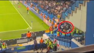 A Leeds fan fell from the upper tier at Stamford Bridge last night celebrating a goal [upl. by Aribold261]