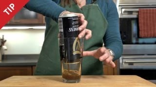 How to Pour the Perfect Guinness from a Can  CHOW Tip [upl. by Murvyn]