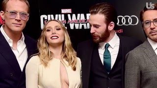 Chris Evans Cant Stop Staring at Elizabeth Olsens Red Carpet Cleavage [upl. by Serene]