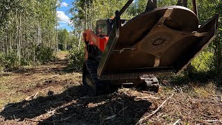 Using the Coolest Skidsteer Attachment [upl. by Kubiak]