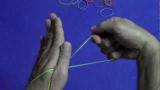 Rubber Band Through Hand  Tutorial [upl. by Ariada404]