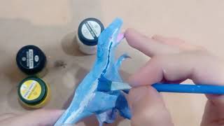 Repaint on velociraptor as Blue Turning clay raptor into Blue [upl. by Mackler]