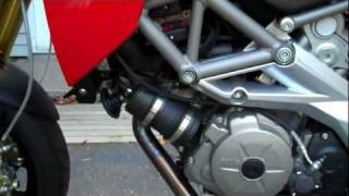 Aprilia Dorsoduro evaporative emissions canister removal [upl. by Lamarre610]