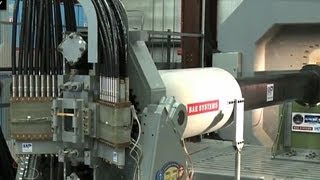 US Navy unveils highspeed rail gun [upl. by Einaffets]