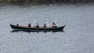 Rowing boat in Bressay Sound as seen from the Northlink Ferry by Lerwick Shetland Scotland [upl. by Fredelia]