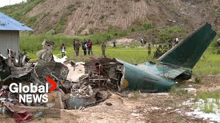 Nepal plane crash at Kathmandu airport kills 18 quotPlane broke into 2 piecesquot [upl. by Asuncion315]