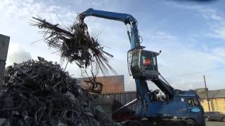 Fuchs MHL 331 and MHL 320 handling scrap metal at Southwark Metals [upl. by Nirihs]