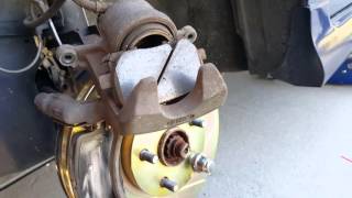 06 corolla xrs front and rear brake replacement [upl. by Attinahs]