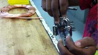 HVAC Basics Skills Tools amp Procedures How to flare ACR copper tubing using a clamp block amp yoke [upl. by Airbmac]