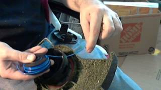 Homelite string trimmer cartridge replacement [upl. by Melburn]