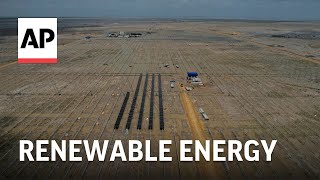 India builds its largest renewable energy project in the salt deserts bordering Pakistan [upl. by Heppman7]