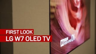 Incredible LG OLED TV hangs totally flush against the wall [upl. by Mimi]