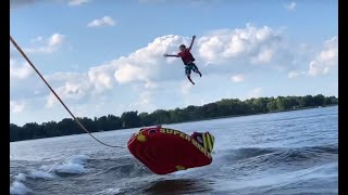 Kid ejected off tube behind surf boat slow motion [upl. by Enitsyrk]