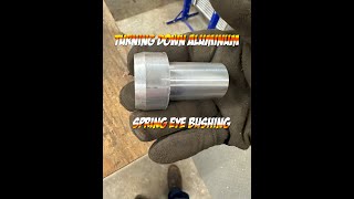 Turning down spring eye bushing on lathe [upl. by Naillig]